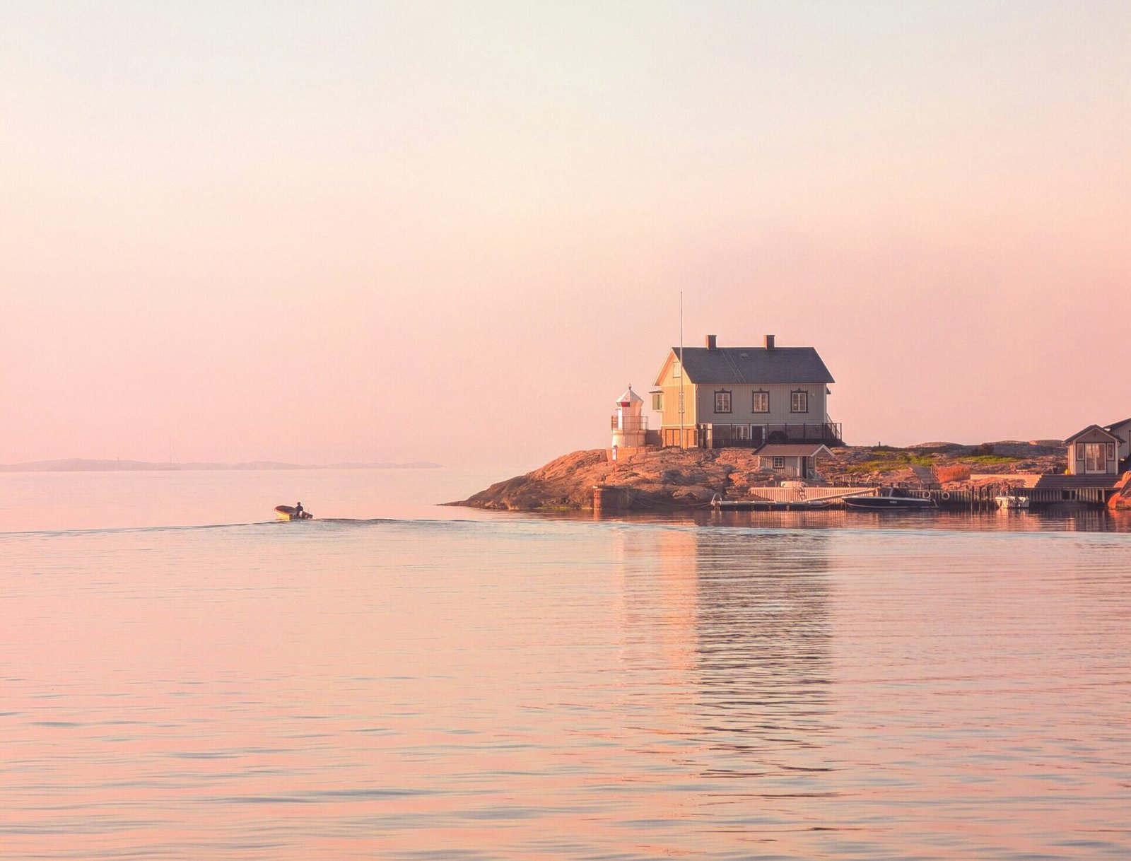 Serene waterfront with a house.